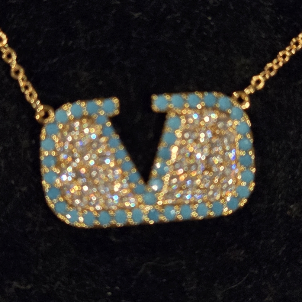 Elegant Gold and Blue Pendant Necklace
